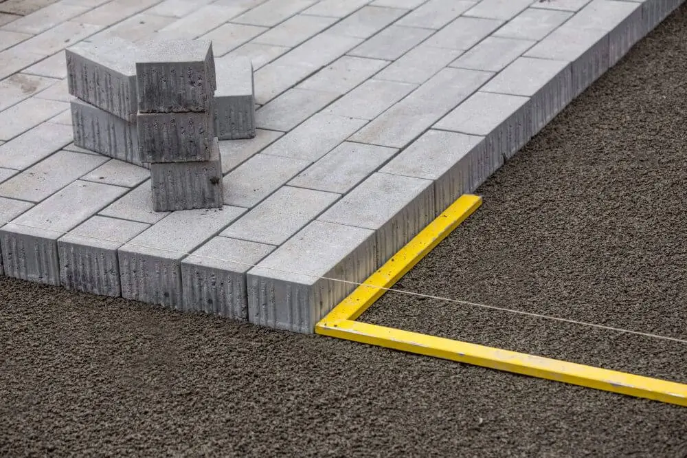 how to lay pavers with bluestone dust or concrete sand